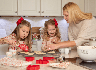 girls and mom making cookies