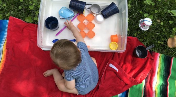 pic of toddler playing with DIY water table