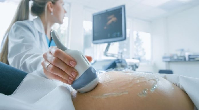 pic of woman getting an ultrasound during pregnancy