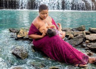 pic of black mother nursing infant
