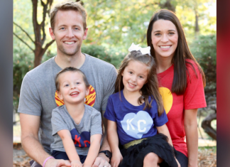 family pic: man, woman, boy, and girl in KC shirts