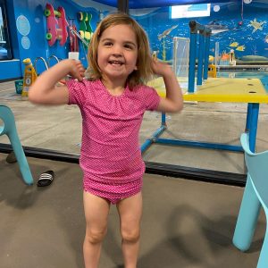 girl in swim suit after swimming lessons