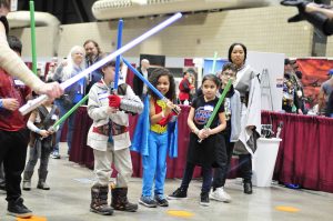 kids dressed as super hero at Planet Comicon