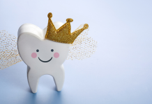 smiling tooth with gold crown