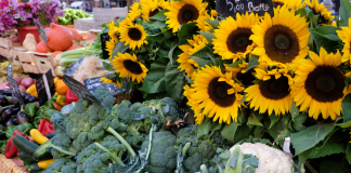 vegetables and sunflowers at farmer's market