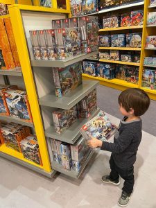 child in Legoland gift shop