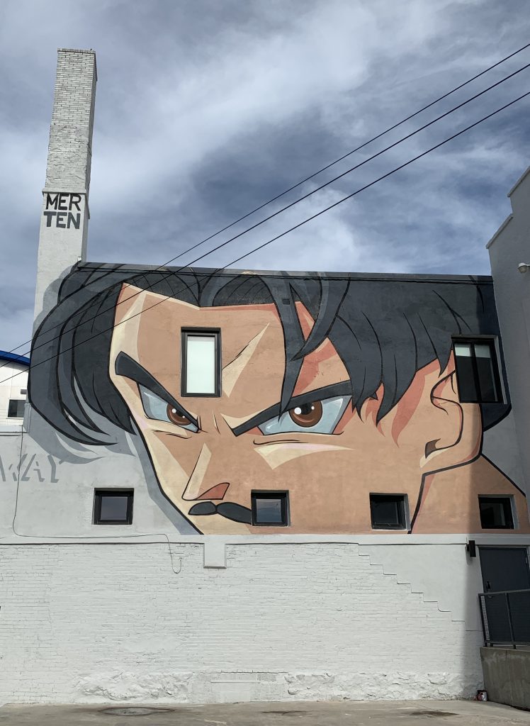 painted mural with anime man