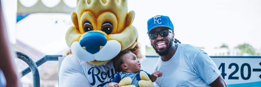 family with Royals mascot at Kauffman Stadium