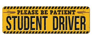 yellow caution sign with copy Please be patient - student driver